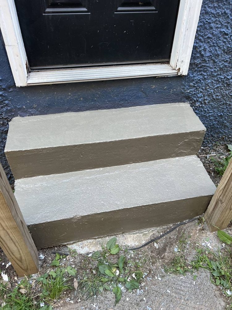 Concrete entry steps repaired square and solid, after the work