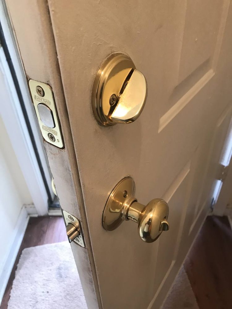 Entry door hardware and deadbolt installed