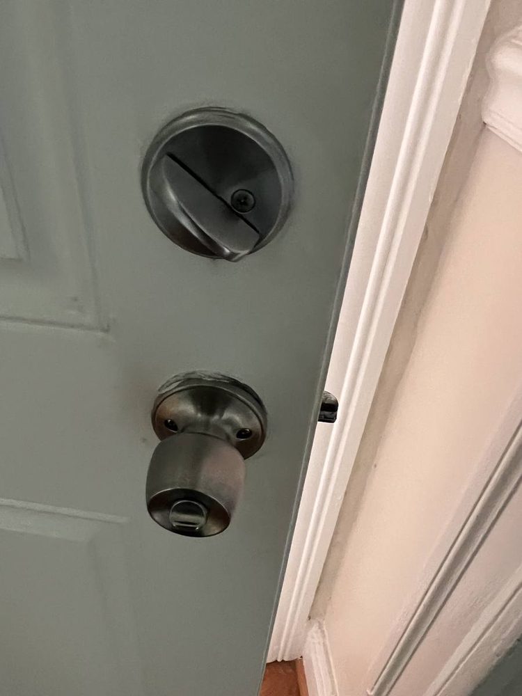 Entry door hardware and deadbolt installed