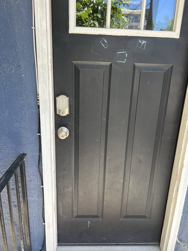 Entry door hardware and deadbolt installed