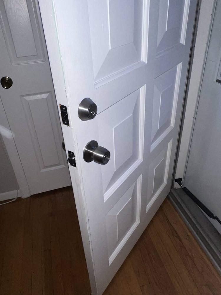 Entry door hardware and deadbolt installed, after the work