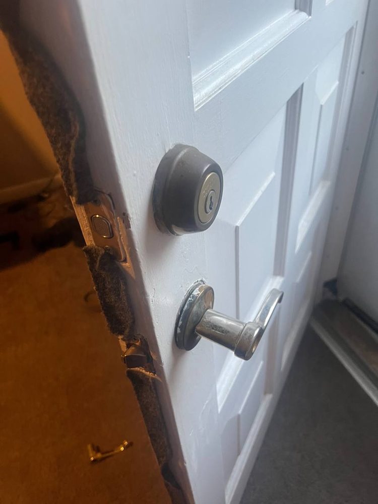 Entry door hardware and deadbolt installed, before the work