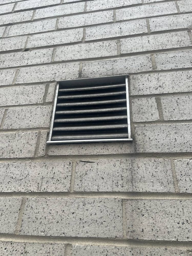 Exterior dryer vent hood and wall penetration