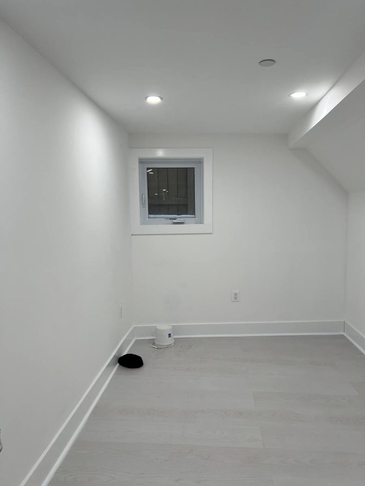 Hardwood flooring repaired and refinished in a residential room