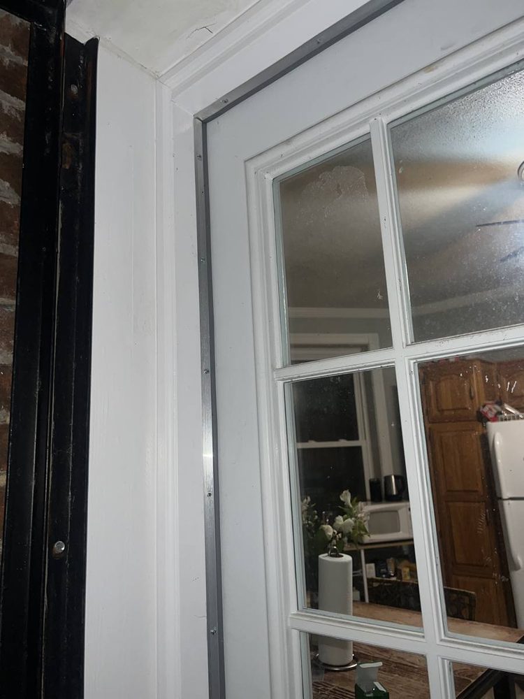 Interior door hung, trimmed and finished in a doorway