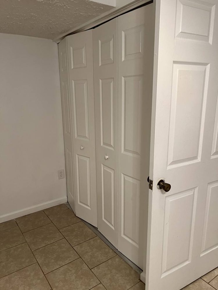 Interior door hung, trimmed and finished in a doorway