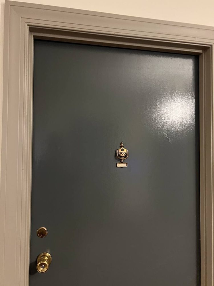 Interior door hung, trimmed and finished in a doorway
