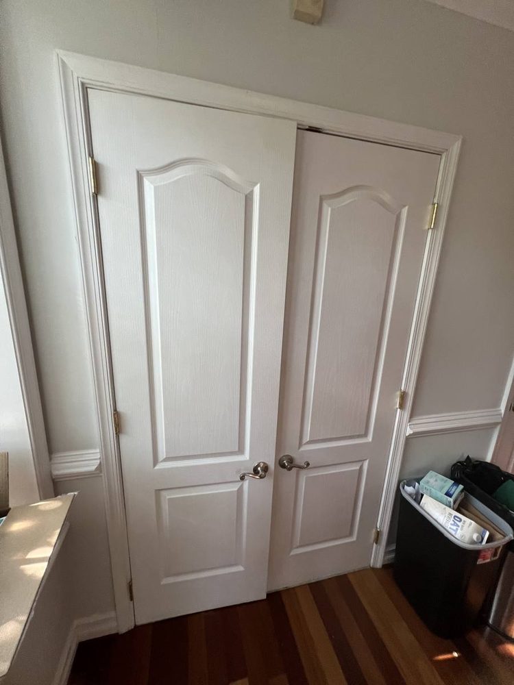 Interior door hung, trimmed and finished in a doorway