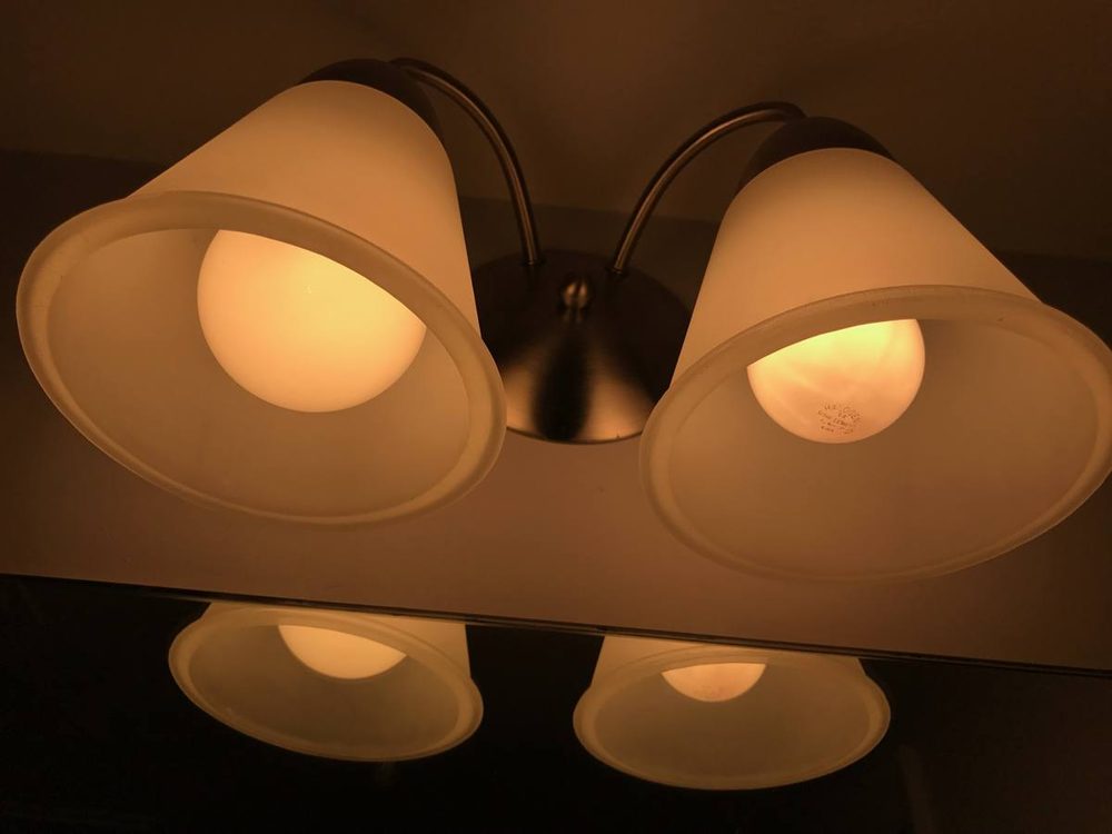 Light fixture mounted and wired to a ceiling