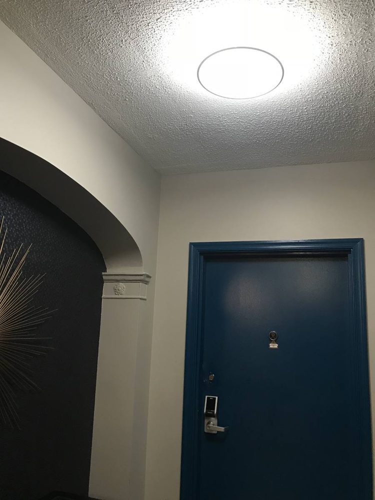 Light fixture mounted and wired to a ceiling