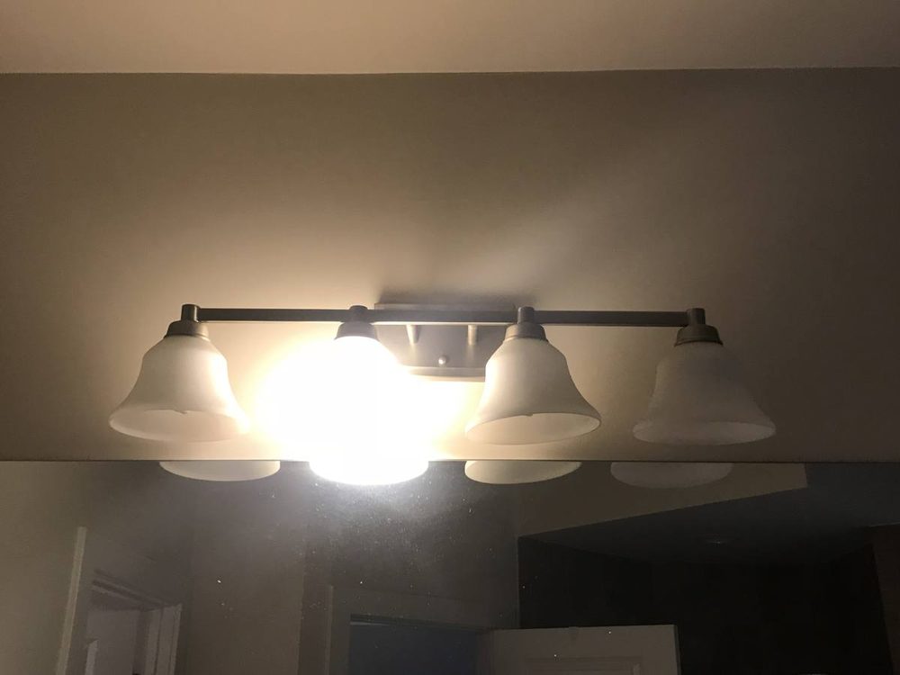 Light fixture mounted and wired to a ceiling