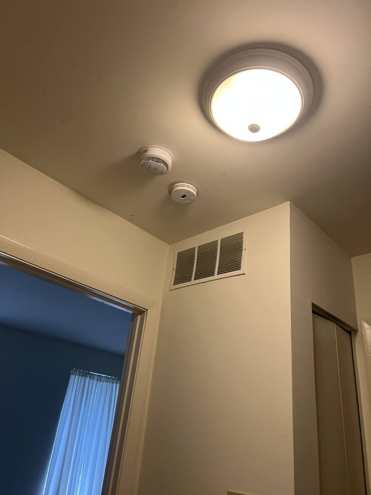 Light fixture mounted and wired to a ceiling