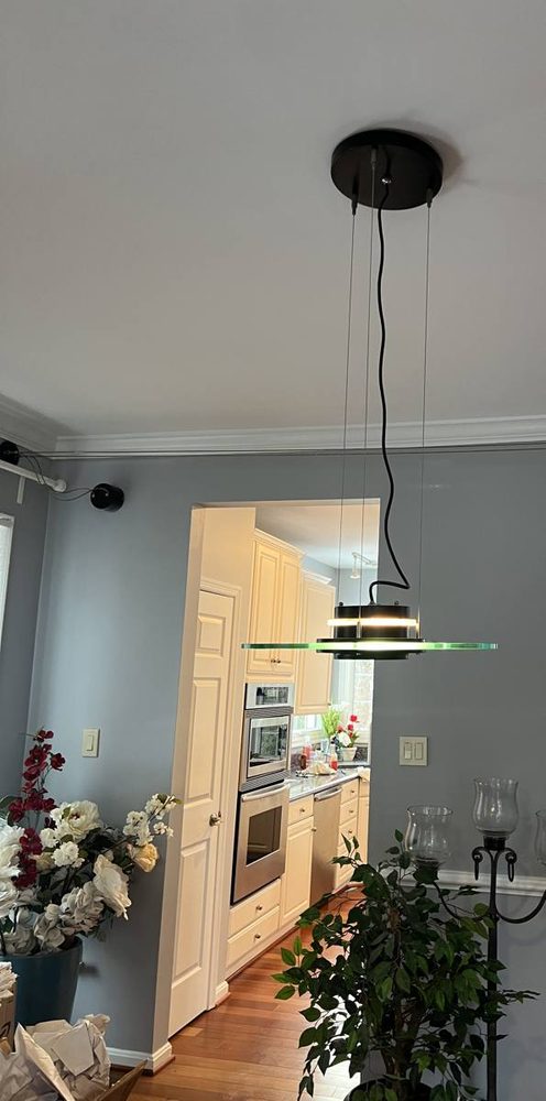 Light fixture mounted and wired to a ceiling