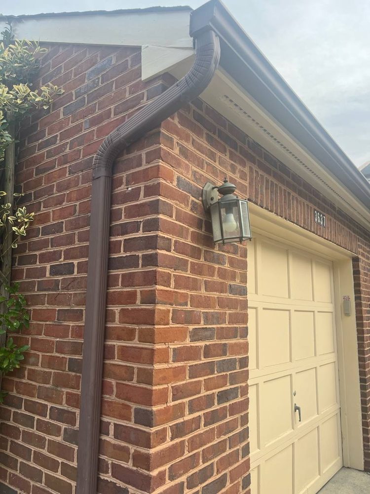 Exterior lighting installed on a home, before the work