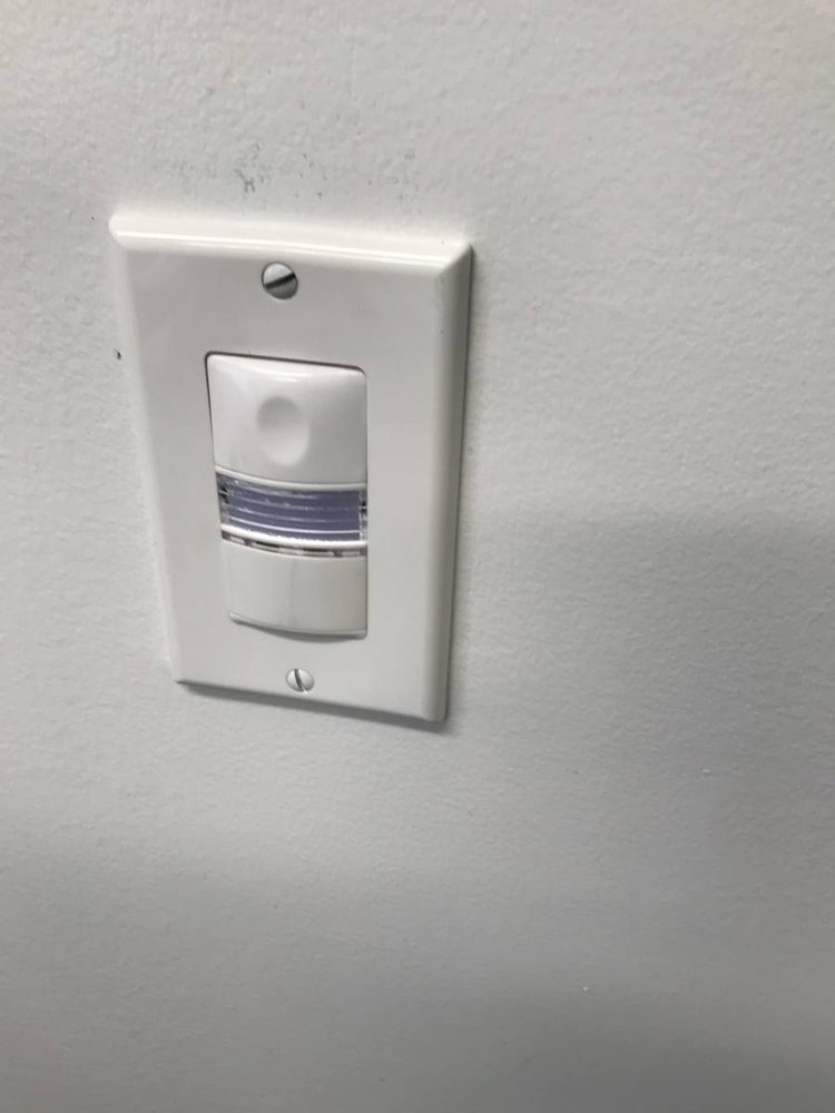 Replacement wall outlet and switch plate installed