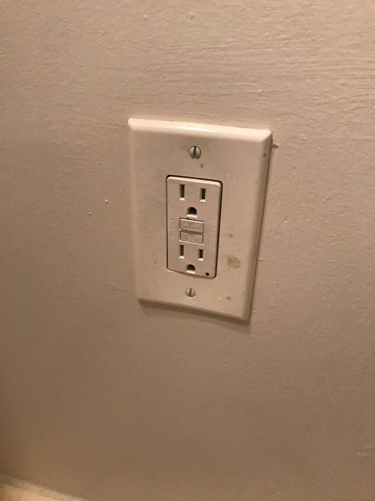 Replacement wall outlet and switch plate installed