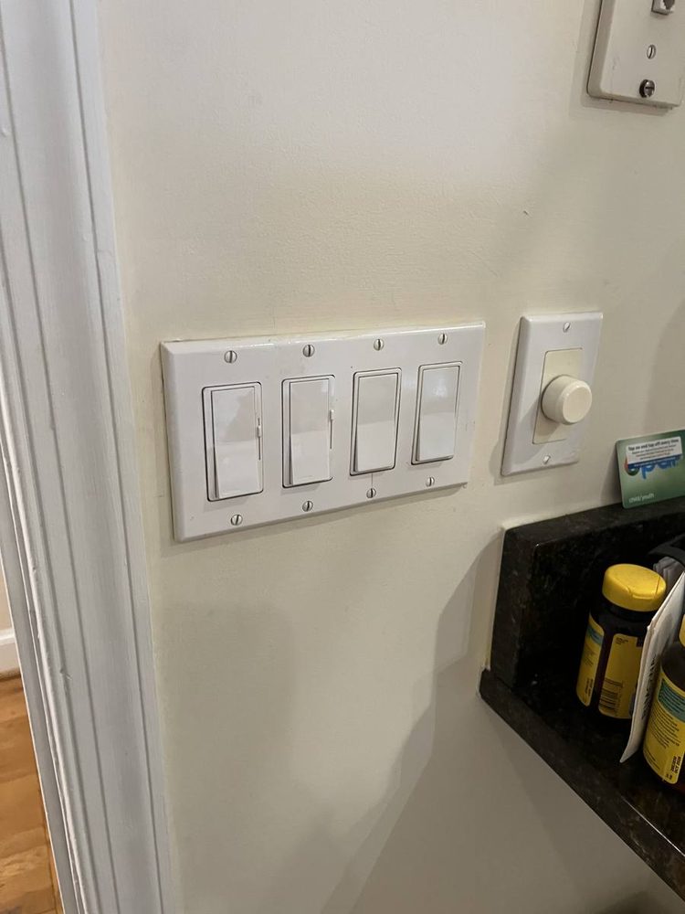 Replacement wall outlet and switch plate installed