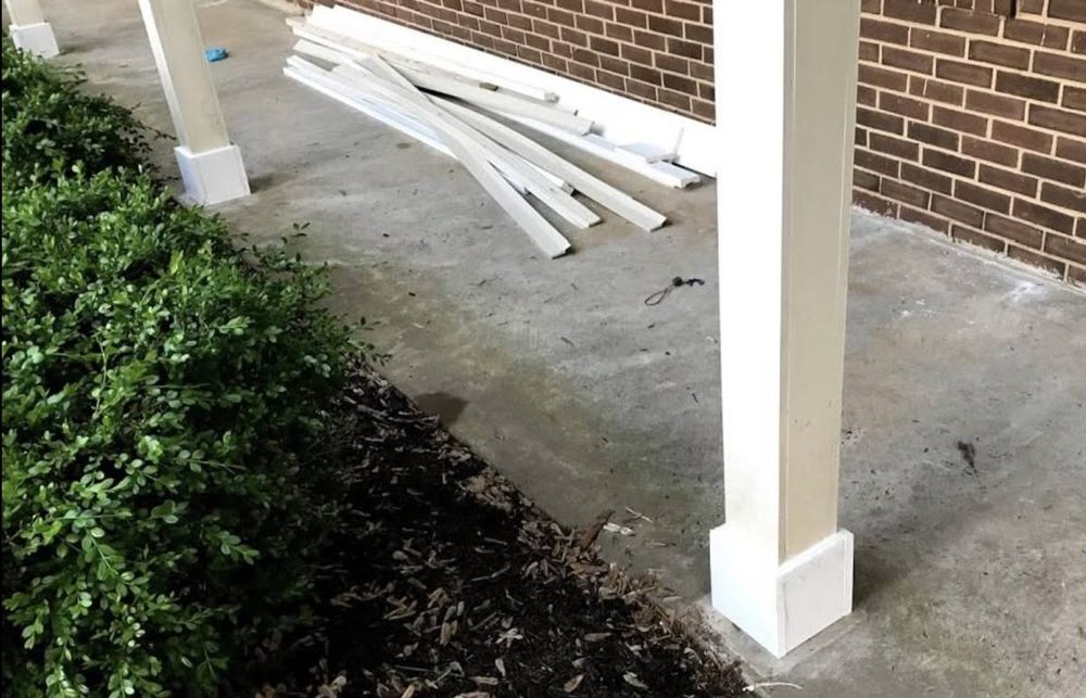Porch column base repaired and refinished, after the work
