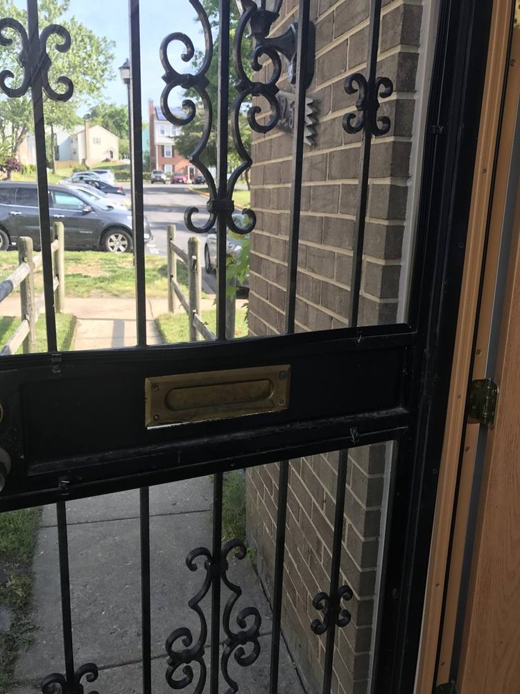 Storm door installed and aligned on a front entry