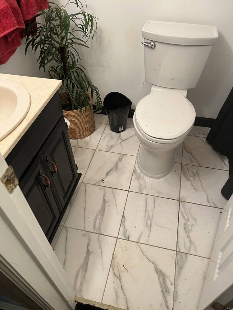Toilet set, sealed and finished in a residential bathroom, after the work