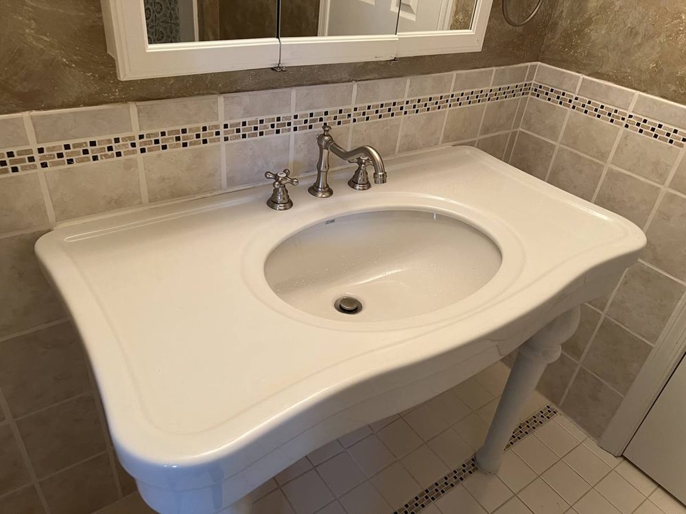 Bathroom vanity and sink installed and plumbed