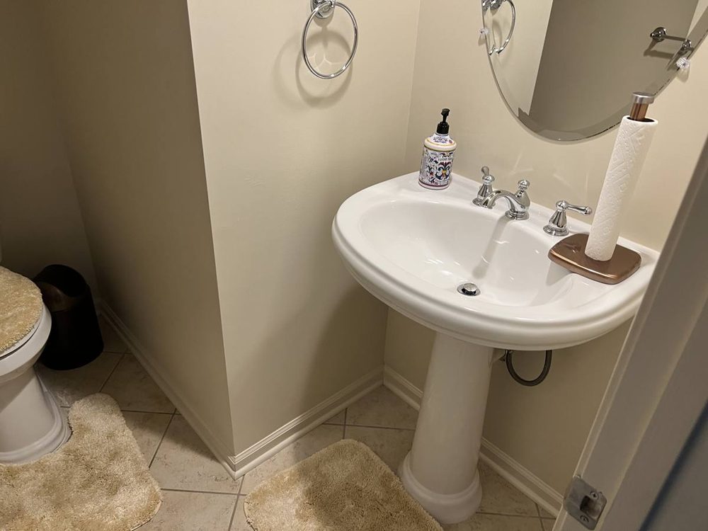 Bathroom vanity and sink installed and plumbed