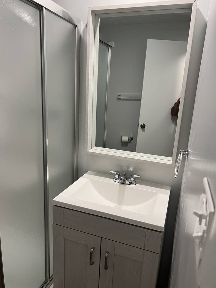 Bathroom vanity and sink installed and plumbed