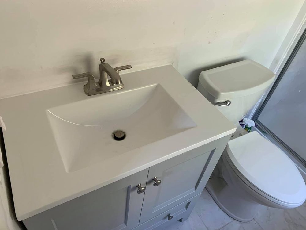 Bathroom vanity and sink installed and plumbed